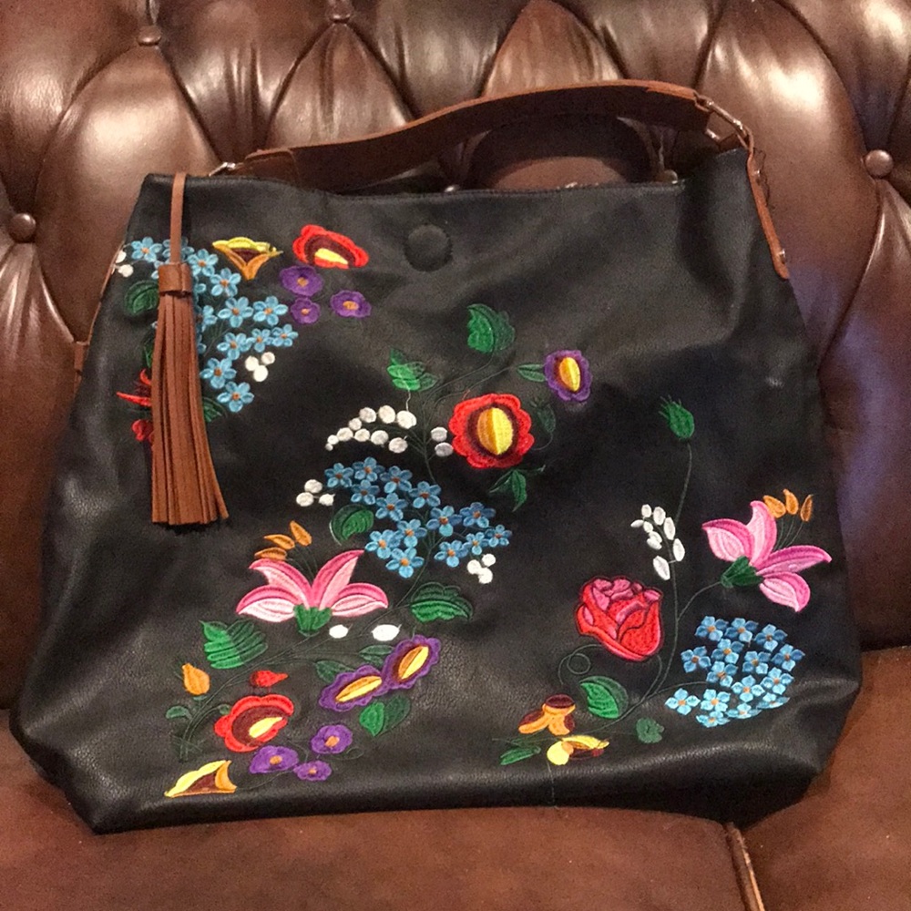 Black bag with embroidered flowers